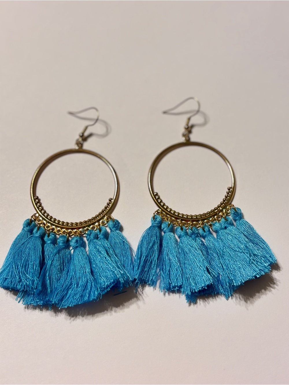 Sky Blue Tassel Earrings in Gold
Tone Bohemian Style